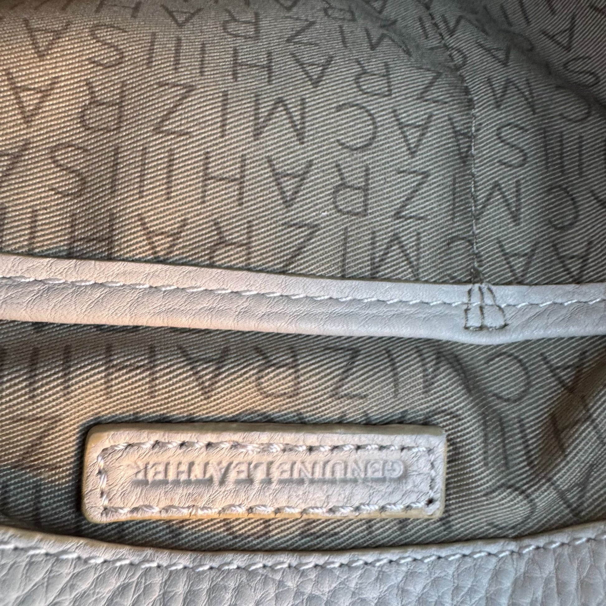 Isaac Mizrahi White Leather Crossbody Bag Gold Charm Tassel Accent Zip Top