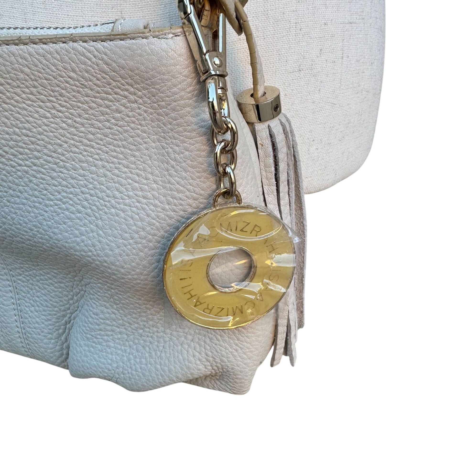 Isaac Mizrahi White Leather Crossbody Bag Gold Charm Tassel Accent Zip Top