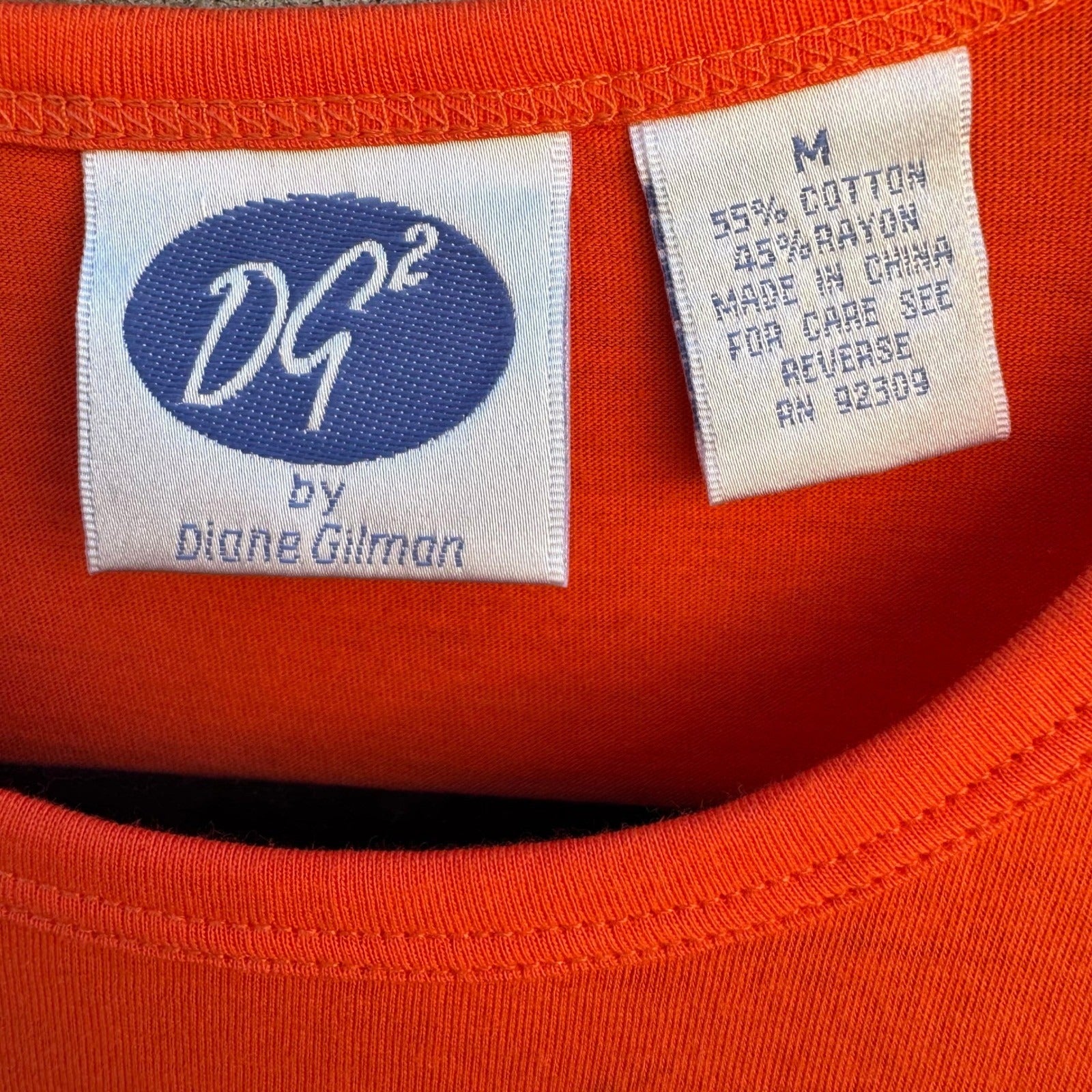 Diane Gilman DG2 Orange Long Sleeve Button Shoulder Pocket Top Womens Medium NEW